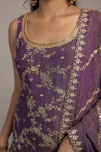 purple shimmer tissue suit detailed with aari and sequins work